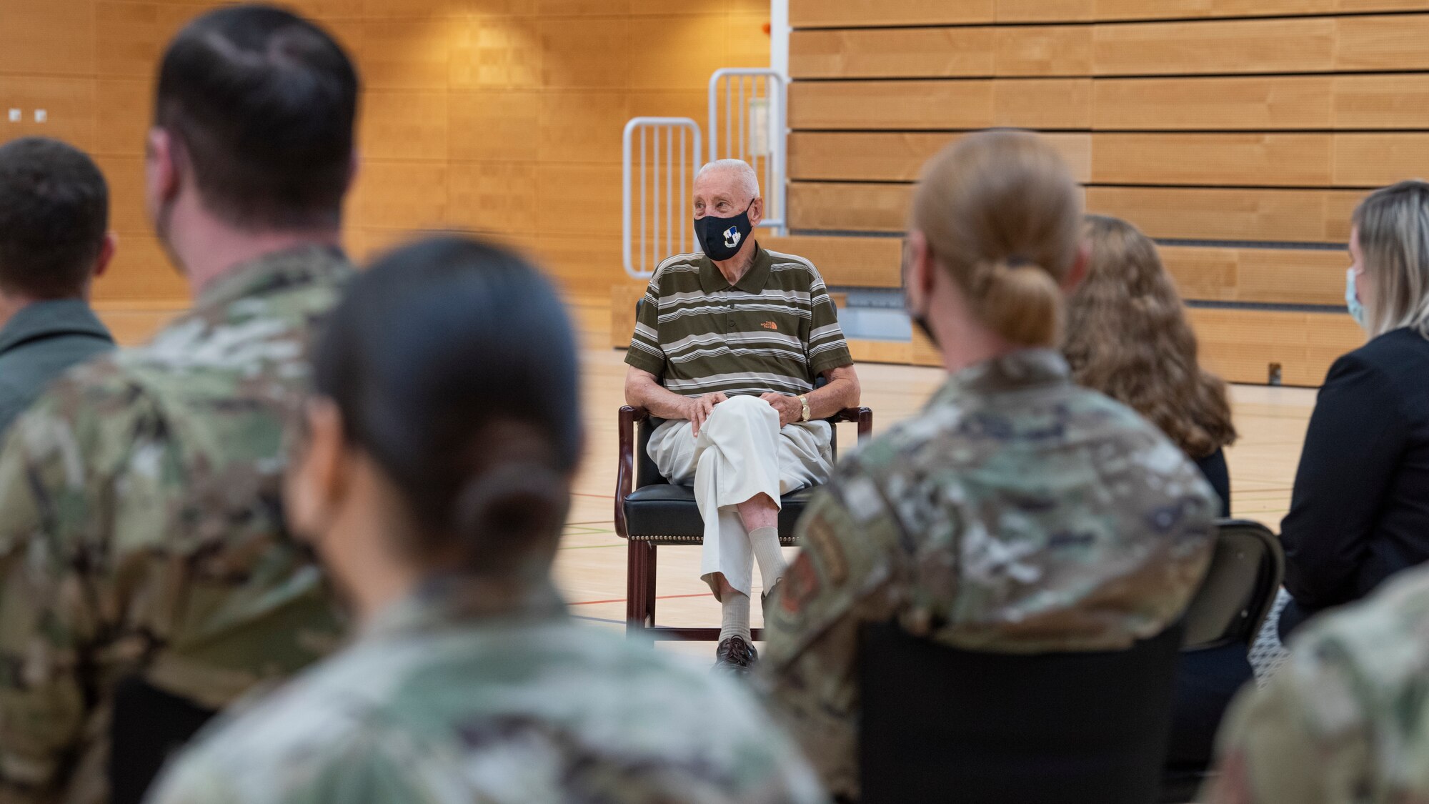 George Price, 52nd Force Support Squadron special events coordinator, listens to remarks by  U.S. Air Force Gen. Tod Wolters, commander of U.S. European Command and NATO Supreme Allied Commander-Europe during an Outstanding Civilian Service Award recognition ceremony, July 14, 2021, on Spangdahlem Air Base, Germany. Price was recognized for his distinguished performance in support of the U.S. Air Force from Feb. 4, 1977 to Feb. 28, 2021. (U.S. Air Force photo by Tech. Sgt. Anthony Plyler)