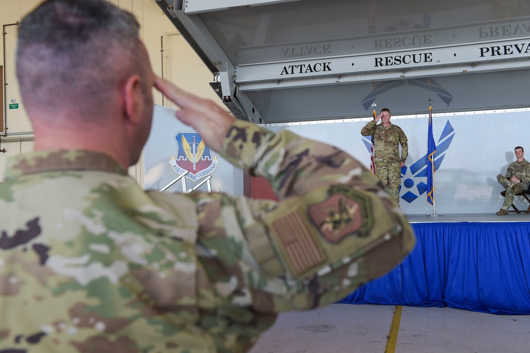 two men saluting