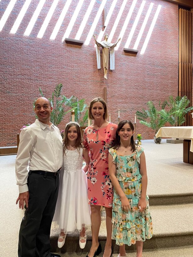 a family poses for a photo