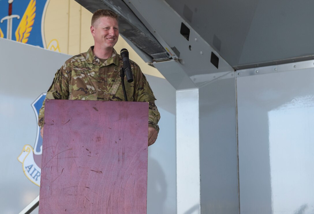 man talking at a podium