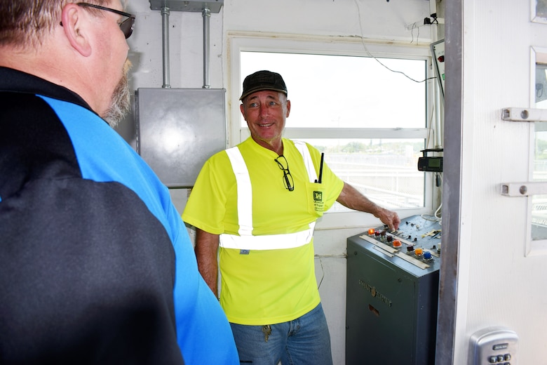 Jacksonville District lock operator Glenn Hutson, opens the lock chambers northbound and southbound from the control gate access room. Pictured (left) William Keeney, supervisory lock operator U.S. Army Corps of Engineers Jacksonville District (right) Glenn Huston.