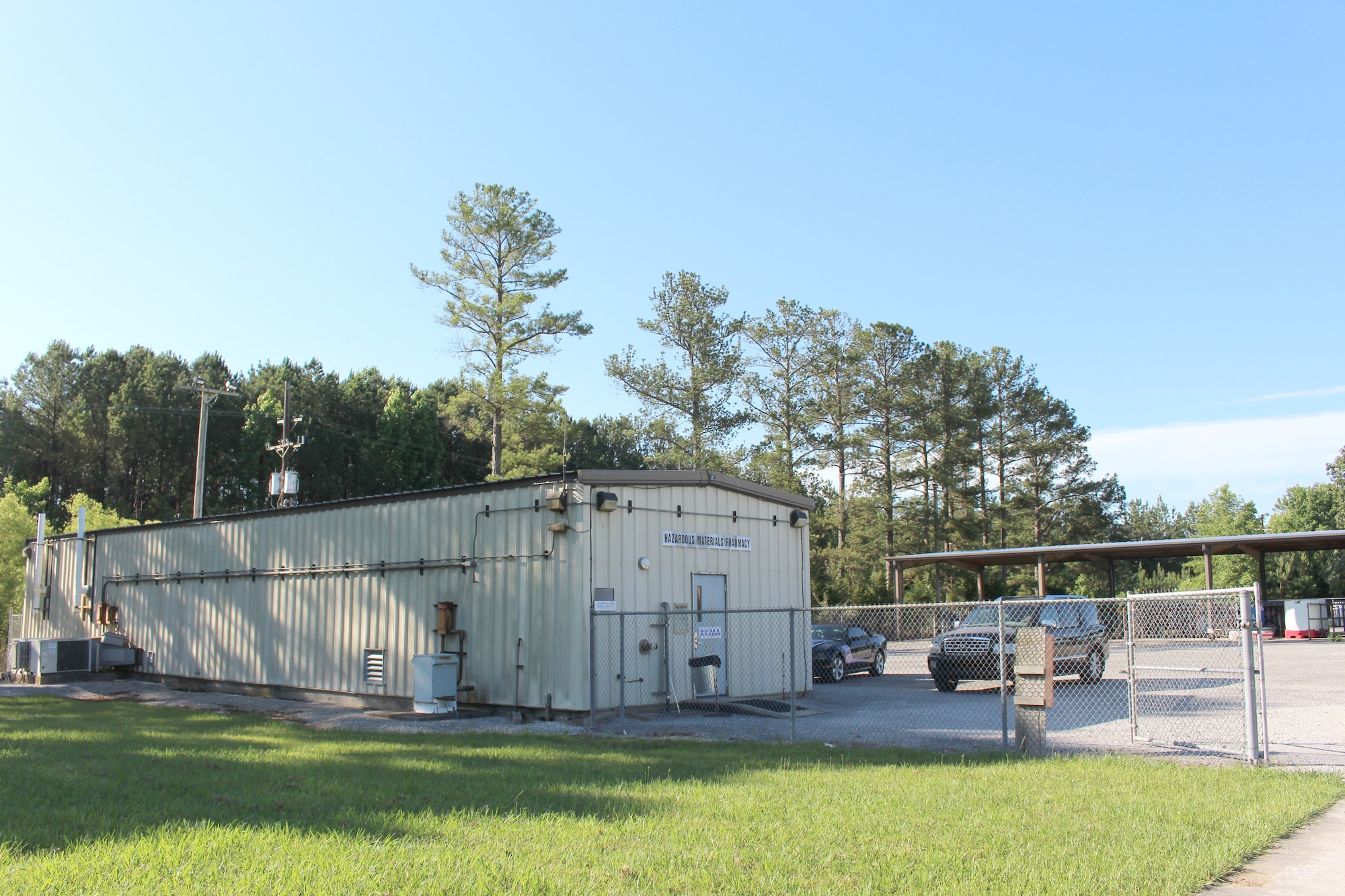 Arnold Air Force Base receives hazardous materials through its HAZMART Pharmacy, pictured here June 15, 2021, at Arnold AFB, Tenn. The HAZMART Pharmacy then distributes these materials and products to the shops on base requesting them. The facility is used by the Hazardous Waste and Hazardous Materials Program at Arnold to provide cradle-to-grave management of hazardous waste. (U.S. Air Force photo by Deidre Moon) (The building number was blurred in this photo for security purposes.)