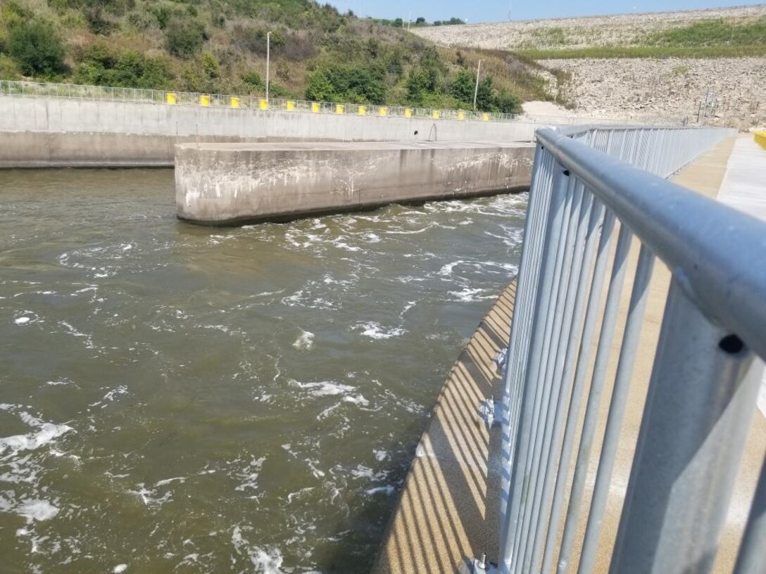 A view of the Tuttle Creek stilling basin from the top of the dam showing the water flow. July 19, 2021. Rehabilitation of the stilling basin will soon be complete.