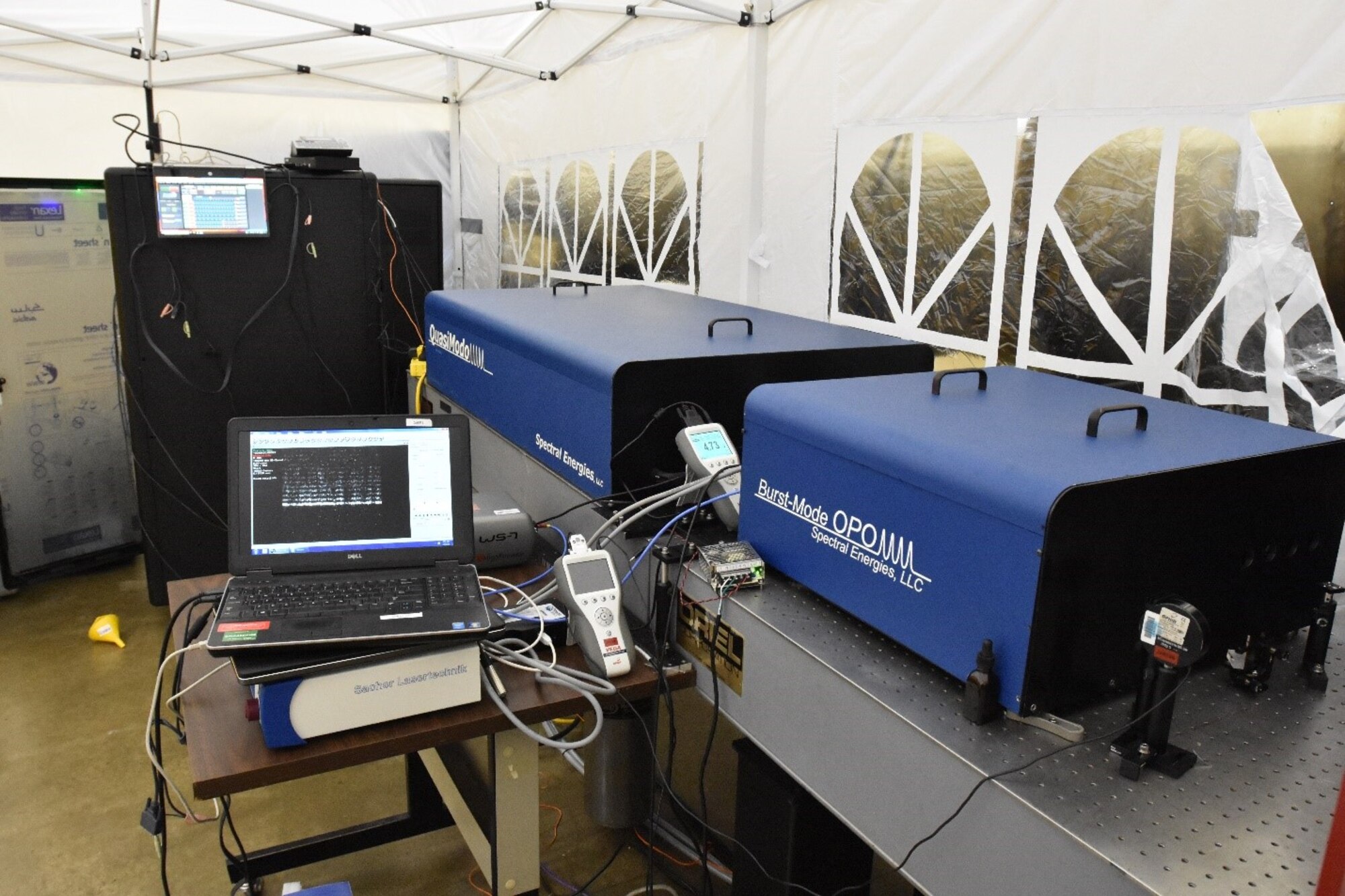 Pictured is the setup of the 100 kHz burst-mode laser-based KTV system, which includes the high-energy burst-mode laser and high-speed Optical Parametric Oscillator. The OPO was developed by Spectral Energies, LLC as part of a Small Business Innovation Research project funded to the company to look into increasing the data rates for the measurement of velocities in hypersonic wind tunnels. The SBIR project was successfully demonstrated at Arnold Engineering Development Complex Hypervelocity Wind Tunnel 9. (U.S. Air Force photo)