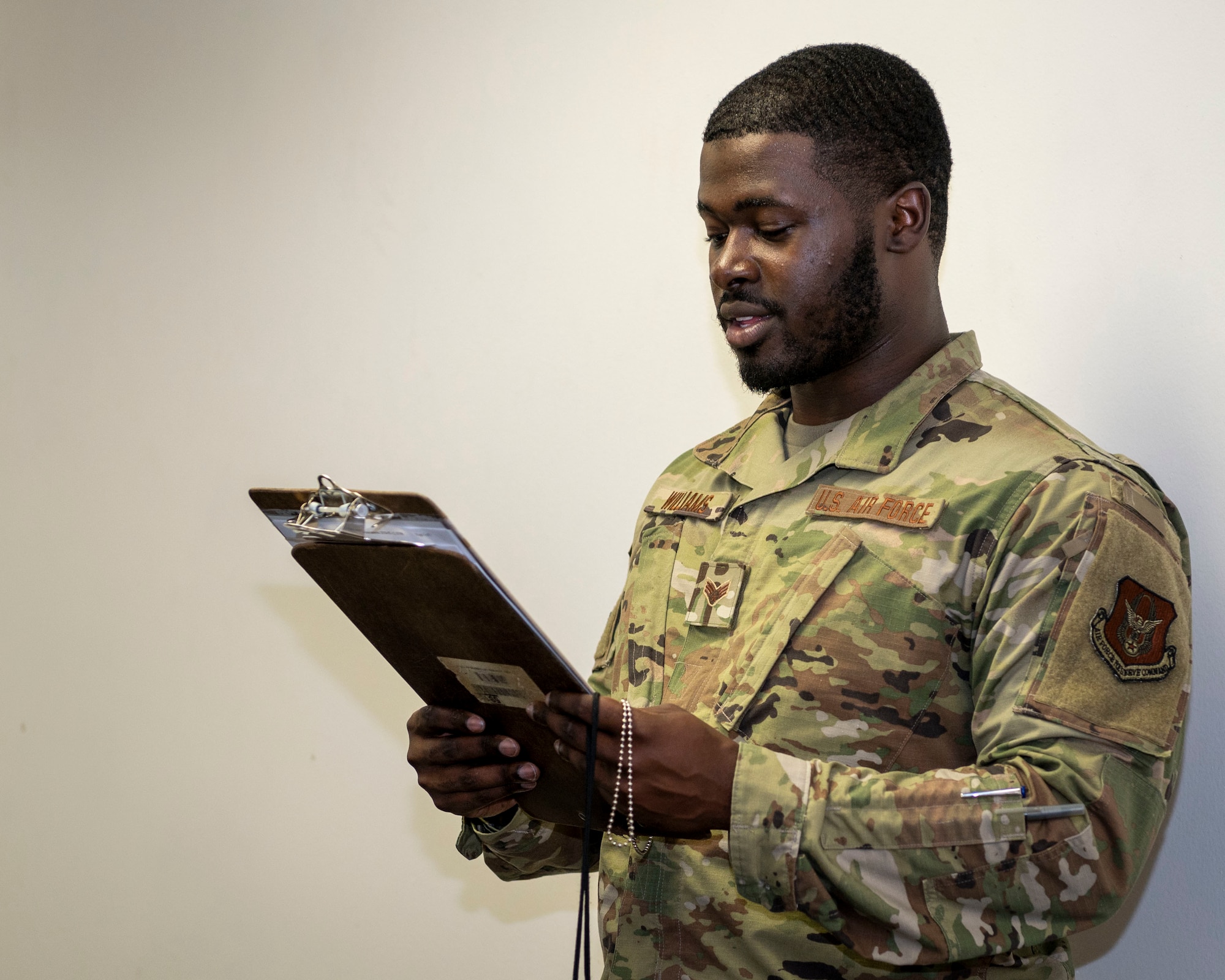 Senior Airman Darius Williams, 916th FSS FAC technician, reads the fitness assessment guidelines at Seymour Johnson Air Force Base, North Carolina, July 15, 2021.