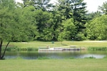 A scene of Suukjak Sep Lake at Pine View Campground in the Pine View Recreation Area is shown June 2, 2021, at Fort McCoy, Wis. The recreation area includes acres of publicly accessible land with hiking trails, Pine View Campground, Whitetail Ridge Ski Area, and Sportsman’s Range. Pine View Recreation Area offers four-season, year-round activities to include camping, hiking, fishing, and more. The lake was formerly known as Squaw Lake. The new name, Suukjak Sep, translates to “black wolf” in the Ho-Chunk language. The lake is a man-made impoundment on Suukjak Sep Creek. The creek itself was named Squaw Creek sometime in the mid-1800s. See more about the Pine View Recreation Area at https://mccoy.armymw