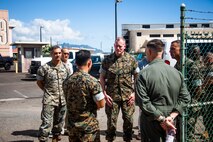 U.S. Marine Corps Maj. Gen. Edward Banta, commander of Marine Corps Installations Command, speaks with a Marine during his visit to Marine Corps Air Station Kaneohe Bay, Marine Corps Base Hawaii, June 25, 2021. As a host platform to the air element of the Marine Air-Ground Task Force, MCAS Kaneohe Bay provides the necessary environment to enable aircraft to deploy at a moment’s notice. (U.S. Marine Corps photo by Lance Cpl. Brandon Aultman)
