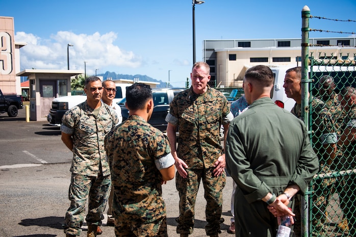 U.S. Marine Corps Maj. Gen. Edward Banta, commander of Marine Corps Installations Command, speaks with a Marine during his visit to Marine Corps Air Station Kaneohe Bay, Marine Corps Base Hawaii, June 25, 2021. As a host platform to the air element of the Marine Air-Ground Task Force, MCAS Kaneohe Bay provides the necessary environment to enable aircraft to deploy at a moment’s notice. (U.S. Marine Corps photo by Lance Cpl. Brandon Aultman)