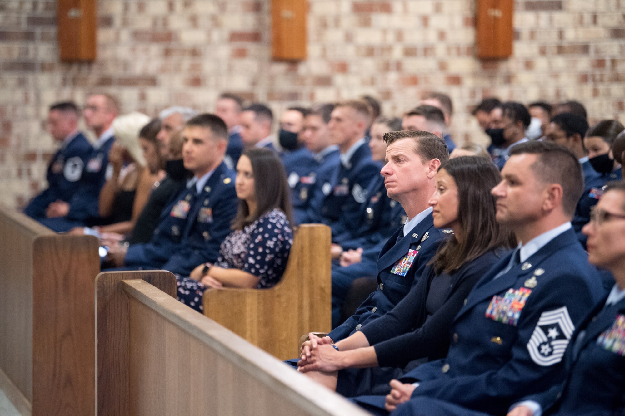 Photo of Airmen and family members