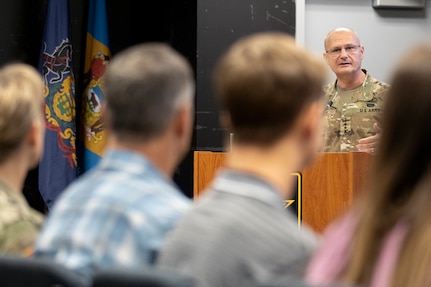 Gen. Edward M. Daly, U.S. Army Materiel Command commanding general, speaks to Col. Paige M. Jennings, U.S. Army Financial Management Command commander, and her family shortly after Jennings assumed command at the Maj. Gen. Emmett J. Bean Federal Center in Indianapolis July 15, 2021. USAFMCOM enables the readiness of America’s Army by serving as the focal point for all finance and comptroller operations while providing capabilities that facilitate accountability, auditability and stewardship. (U.S. Army photo by Mark R. W. Orders-Woempner)