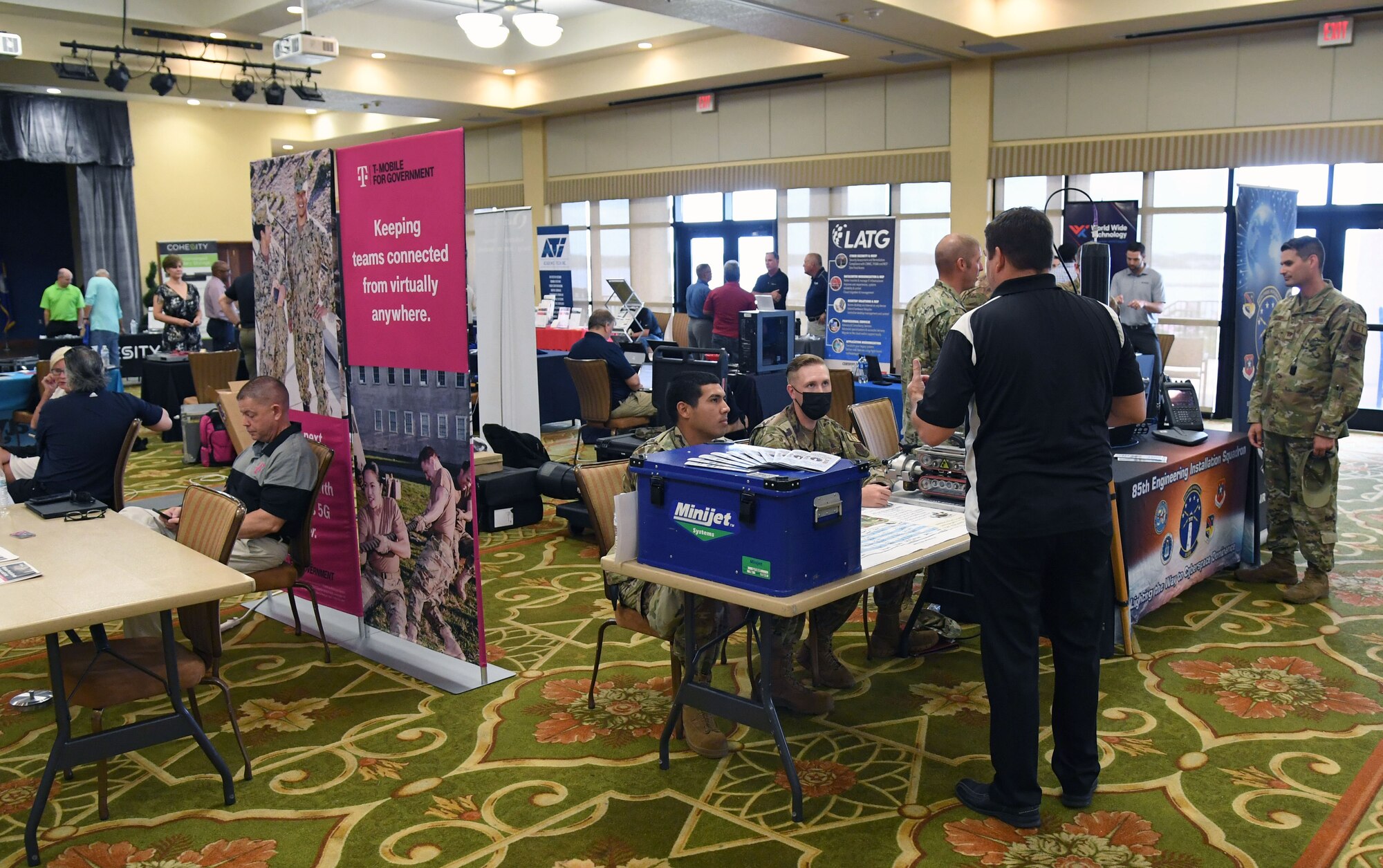 Keesler personnel attend the Technology Expo inside the Bay Breeze Event Center at Keesler Air Force Base, Mississippi, July 15, 2021. The expo, hosted by the 81st Communications Squadron and the Armed Forces Communications and Electronics Association Gulf Coast Chapter, was held to introduce military members to the latest in technological advancements to bolster the Air Force's capabilities in national defense. (U.S. Air Force photo by Kemberly Groue)
