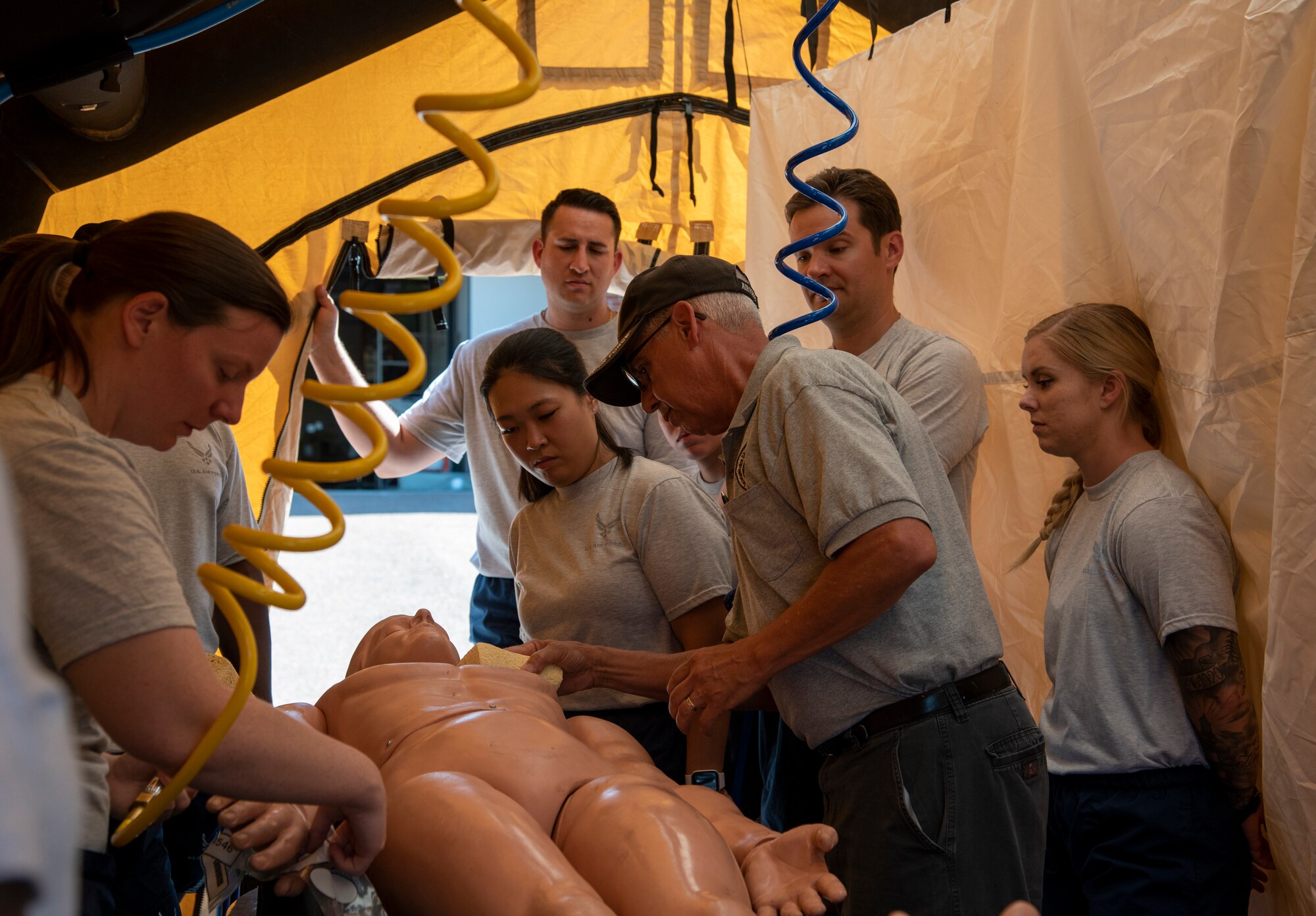 Airmen learn decontamination before exercise.