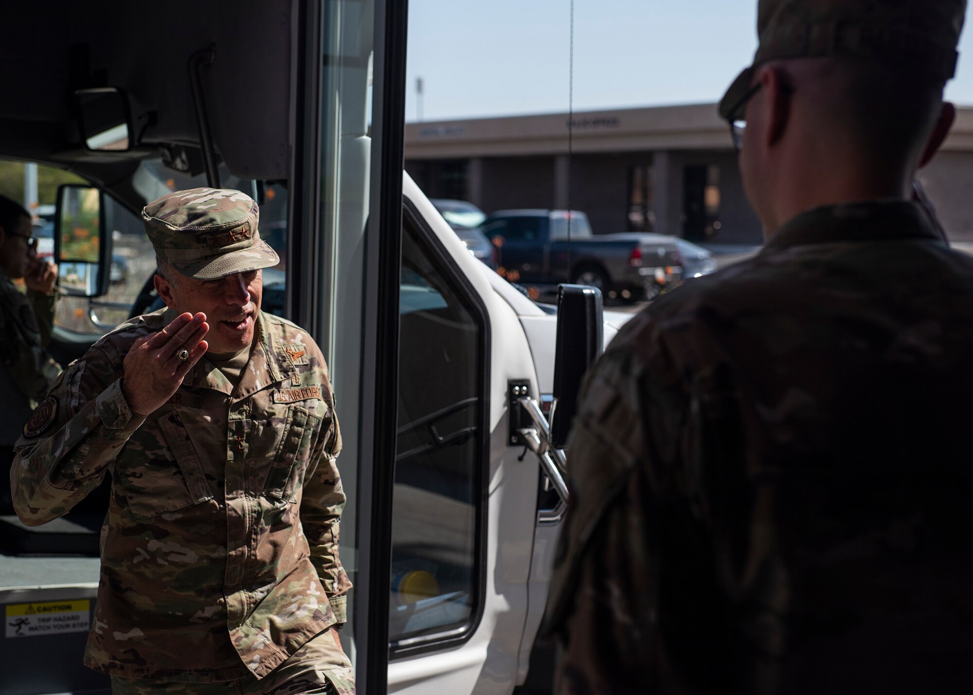 Lt. Gen. Robert Miller, U.S. Air Force and U.S. Space Force surgeon general, salutes Master Sgt. Zachary Bartlett, 99th Medical Support Squadron