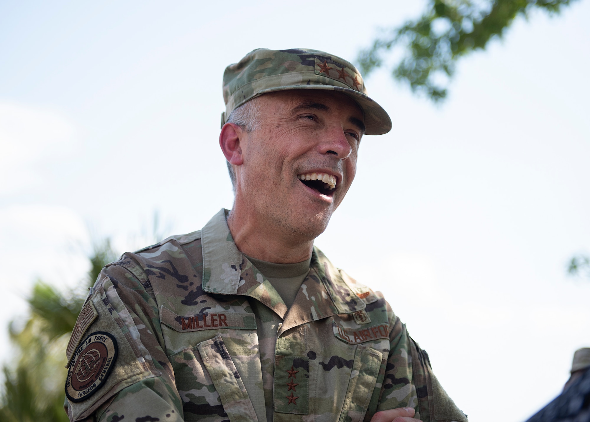 Lt. Gen. Robert Miller, U.S. Air Force and U.S. Space Force surgeon general, talks to a member assigned to the 99th Medical Group