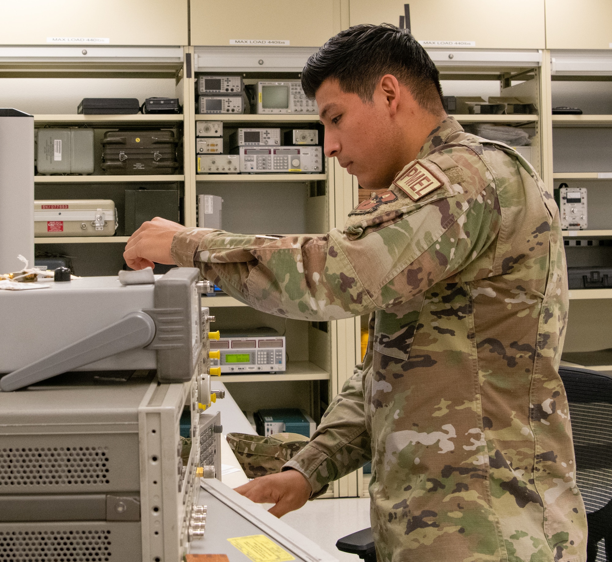 Staff Sgt. Vicente Jimenez, 56th Component Maintenance Squadron precision measurement equipment lab technician, calibrates a spectrum analyzer July 1, 2021, at Luke Air Force Base, Arizona. The spectrum analyzer is used to measure the power of a signal’s various frequency components. PMEL technicians ensure accurately calibrated equipment to support the needs of the Air Force, sister services and allied forces.