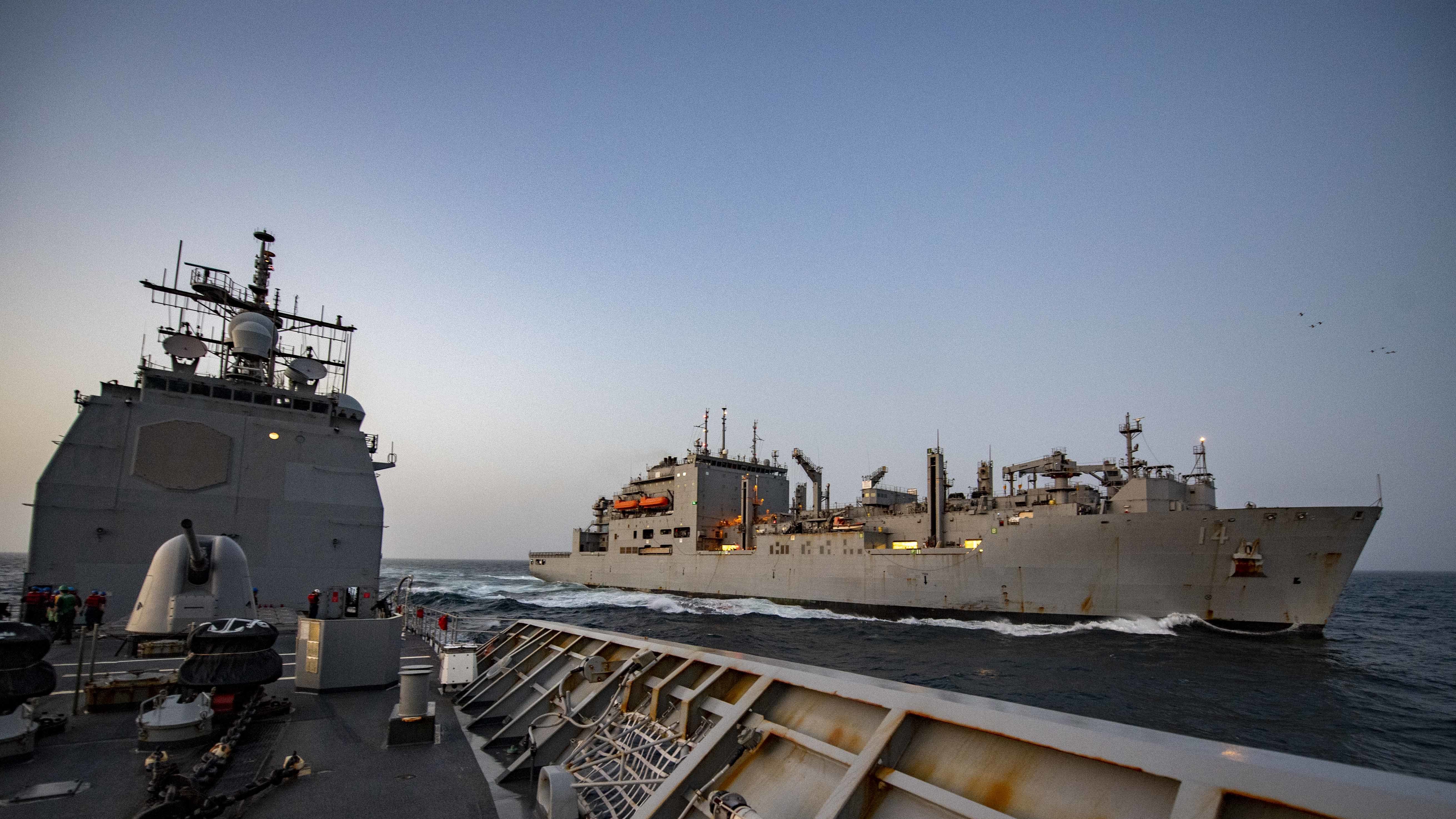 The guided-missile cruiser USS Shiloh (CG 67) conducts a replenishment-at-sea with the Military Sealift Command dry cargo and ammunition ship USNS Cesar Chavez (T-AKE 14).