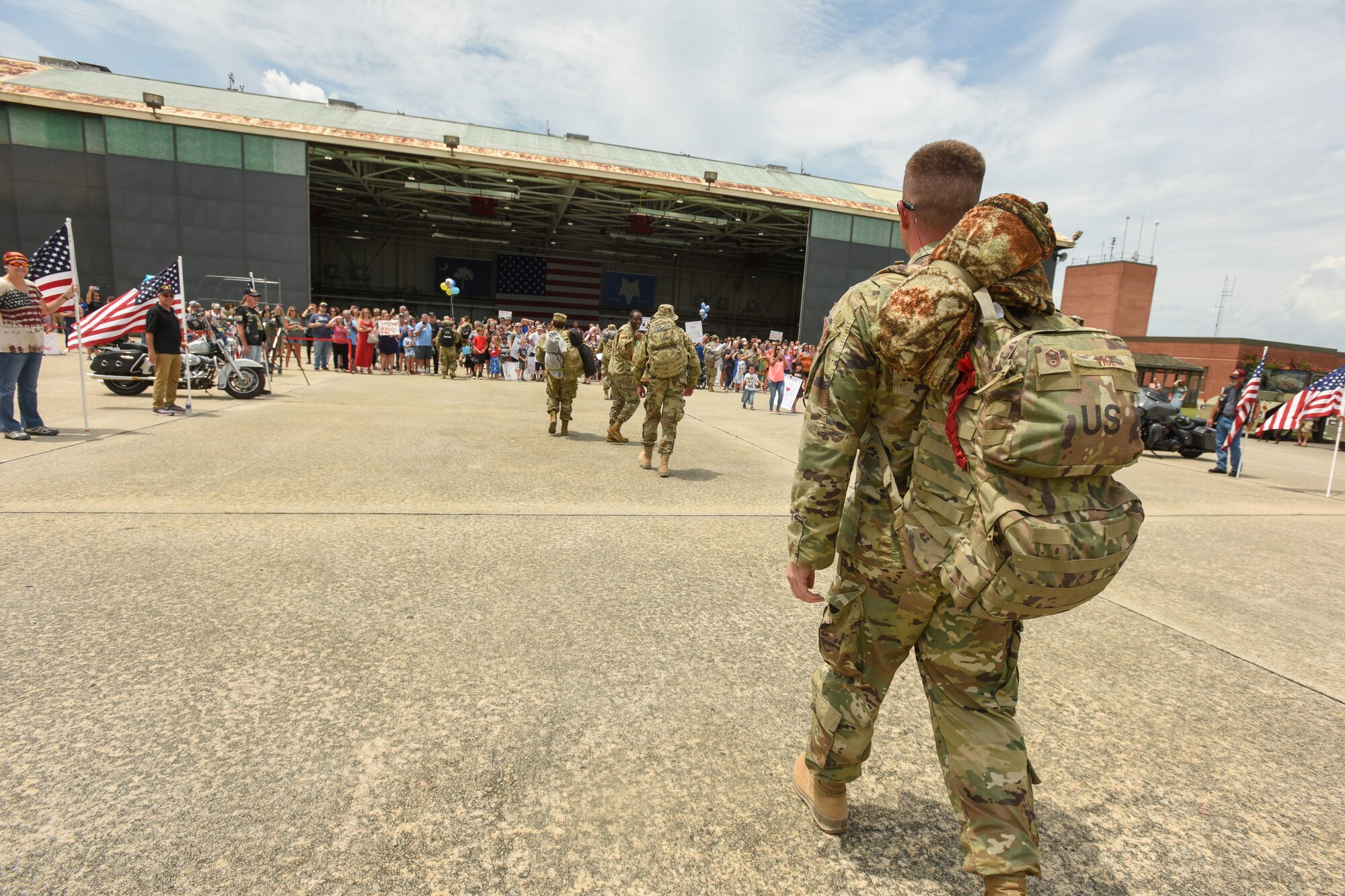 U.S. Air Force personnel recently deployed to Prince Sultan Air Base, Kingdom of Saudi Arabia, return home July 18, 2021 to the 169th Fighter Wing at McEntire Joint National Guard Base, South Carolina. "Swamp Fox" Airmen from the South Carolina Air National Guard’s 169th Fighter Wing were deployed to PSAB for the past three months to project combat power and help bolster defensive capabilities against potential threats in the region. (U.S. Air National Guard photo by Tech. Sgt. Megan Floyd, 169th Fighter Wing Public Affairs)