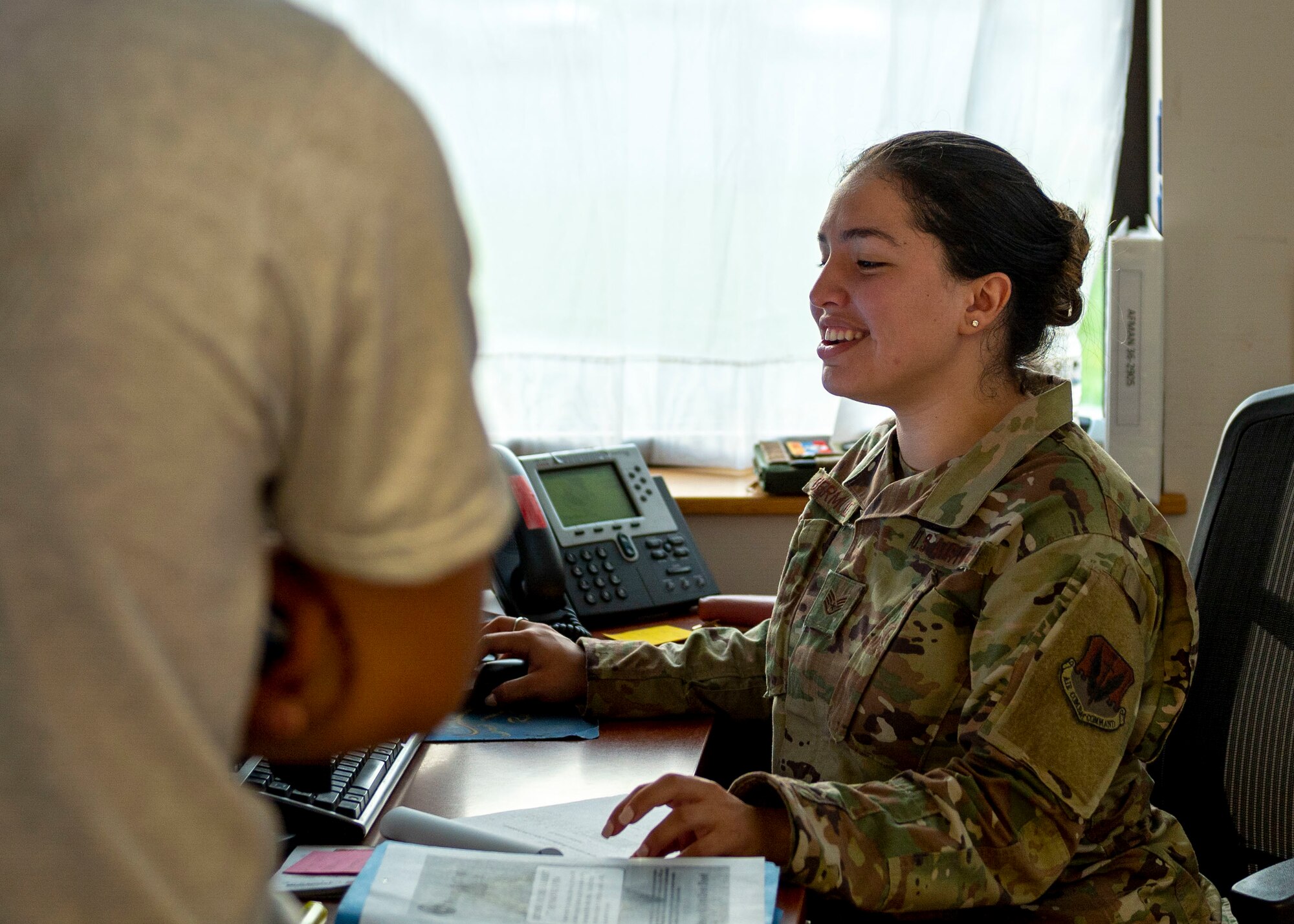 Staff Sgt. Mariana Bermudez, 4th Force Support Squadron fitness assessment cell technician, completes an Airman’s physical assessment paperwork at Seymour Johnson Air Force Base, North Carolina, July 16, 2021.