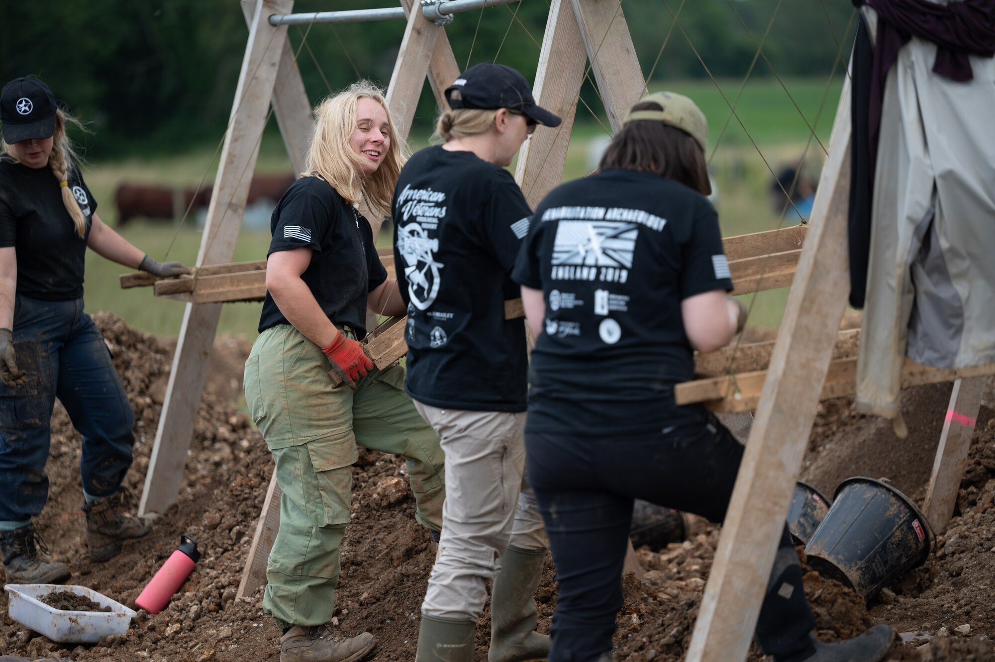 Volunteers with the American Veterans Archeological Recovery group search for remains of fallen service members during a B-24 Liberator excavation at Park Farm in Arundel, England, July 8, 2021. The team was comprised of around 20 volunteers from local universities, veterans from both United States and British armed forces, and active duty service members from RAF Lakenheath. (U.S. Air Force photo by Senior Airman Koby I. Saunders)