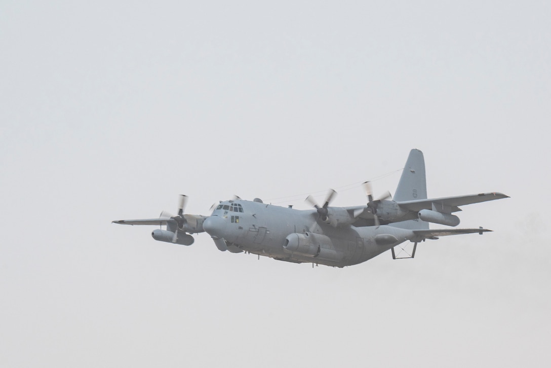 A U.S. Air Force EC-130H Compass Call aircraft, assigned to the 41st Expeditionary Electronic Combat Squadron, takes off in support of a large force employment exercise at Al Dhafra Air Base, United Arab Emirates, July 13, 2021. LFE exercises provide both ADAB and other CENTCOM and coalition forces a unique opportunity to train with international partners in advanced tactics with a broad spectrum of mission sets. (U.S. Air Force photo by Master Sgt. Wolfram M. Stumpf)