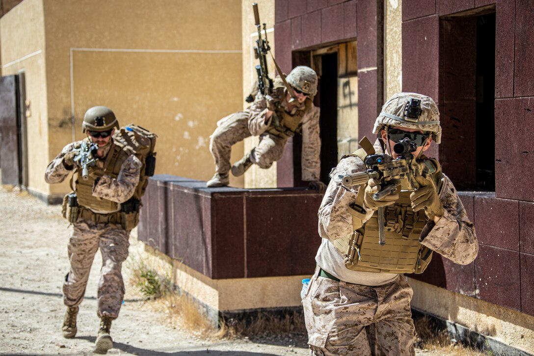U.S. Marines with 2nd battalion, 1st Marines, assigned to Special Purpose Marine Air-Ground Task Force – Crisis Response – Central Command (SPMAGTF-CR-CC) move positions during room clearing procedures in Jordan, May 13, 2021. SPMAGTF-CR-CC is designed to respond rapidly and efficiently to a wide-range of military operations utilizing aviation, ground, and logistics assets. (U.S. Marine Corps photo by Cpl. Jacob Yost)