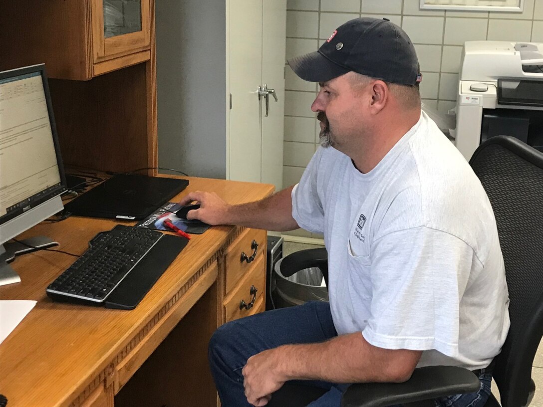 Ryan Johnson, lockmaster at Guntersville Lock in Grant, Alabama, is the U.S. Army Corps of Engineers Nashville District Employee of the Month for May 2021. He is seen here working at Guntersville Lock July 20, 2021. (USACE Photo by Joseph Storm)