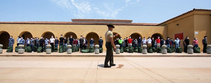 New recruits with Alpha Company, 1st Recruit Training Battalion, participate in receiving at Marine Corps Recruit Depot, San Diego, July 13, 2021.