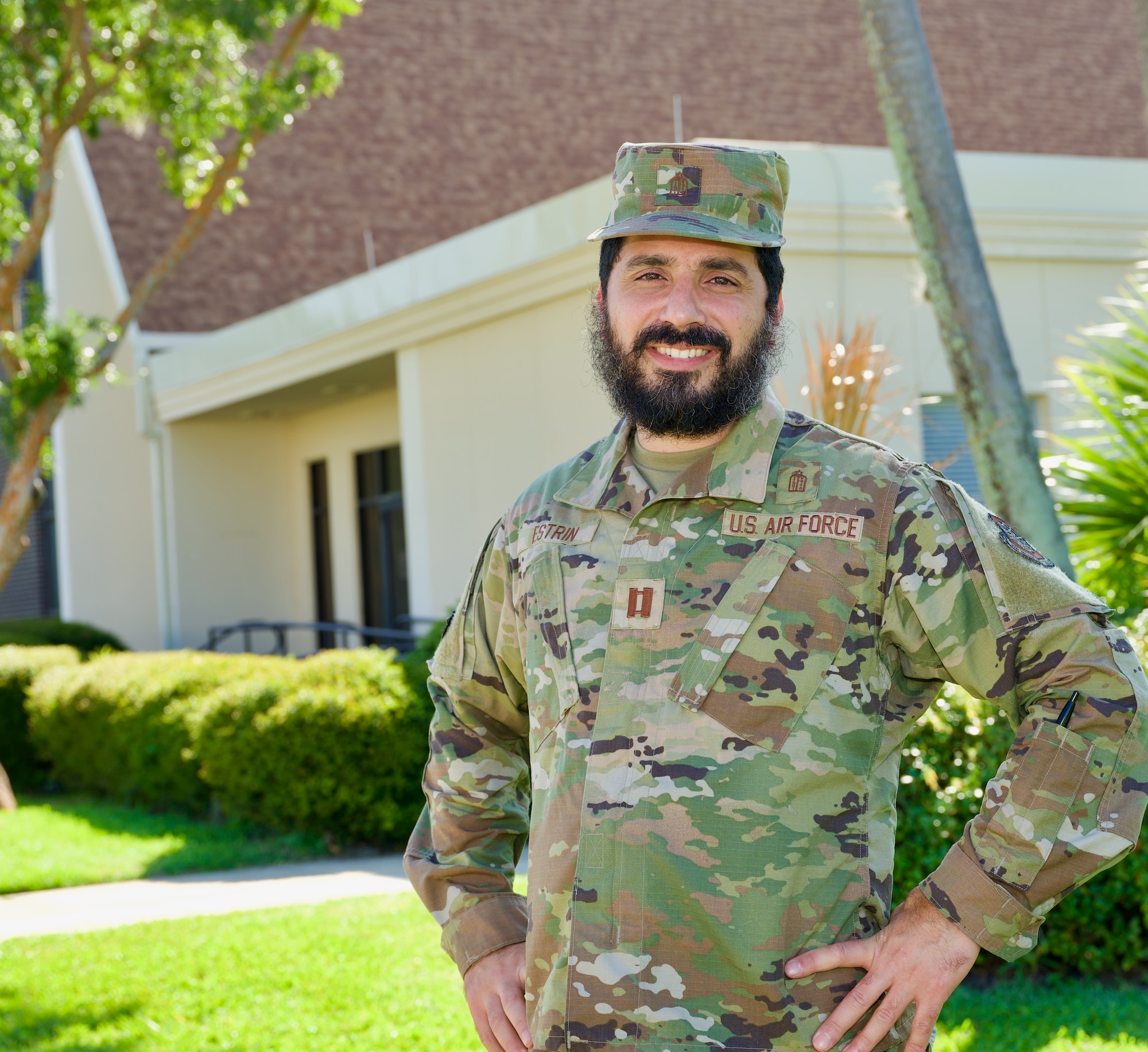 Capt. Eli Estrin, Readiness Integration Organization Detachment 6 Chaplain, poses for a photo in front of the 6th Air Refueling Wing Chapel, MacDill Air Force Base, Florida, July 20, 2021. Estrin supported victims and first responders in Surfside, Florida, in the aftermath of the June 24, 2021 Champlain South Tower condominium collapse. (U.S. Air Force photo by Staff Sgt. Bradley Tipton)