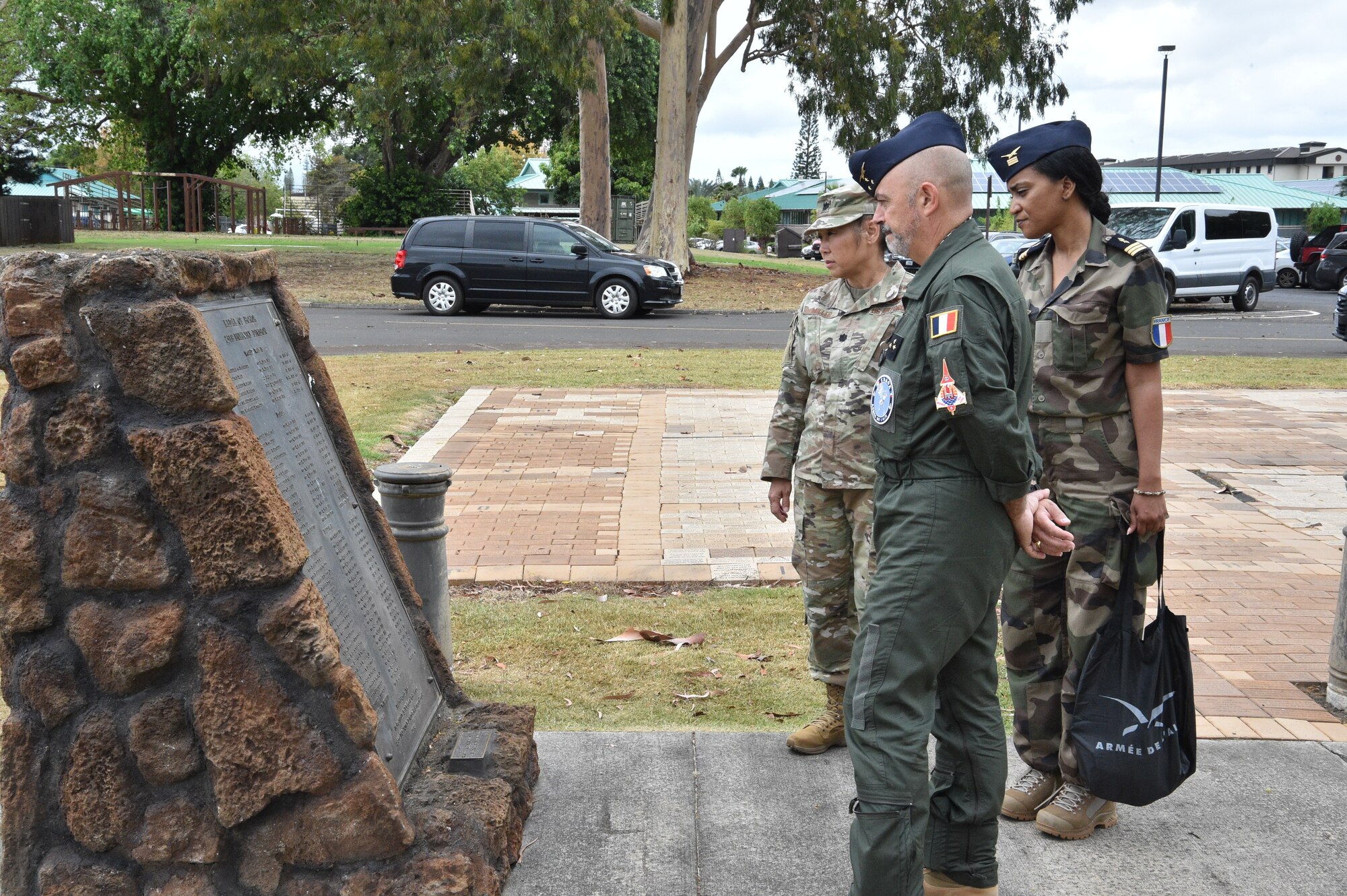 French Air Force Gen. Louis Pena, talks with the members from the 25th Air Support and Operations Squadron to learn about the mission of the Tactical Air Control Party Airmen at Wheeler Army Airfield, Hawaii, June 30, 2021. Pena was briefed on the capabilities of the 25th ASOS and given a demonstration of the Polaris MRZR, a multi-terrain vehicle used by TACP Airmen. (U.S. Air Force photos by 1st Lt. Benjamin Aronson)