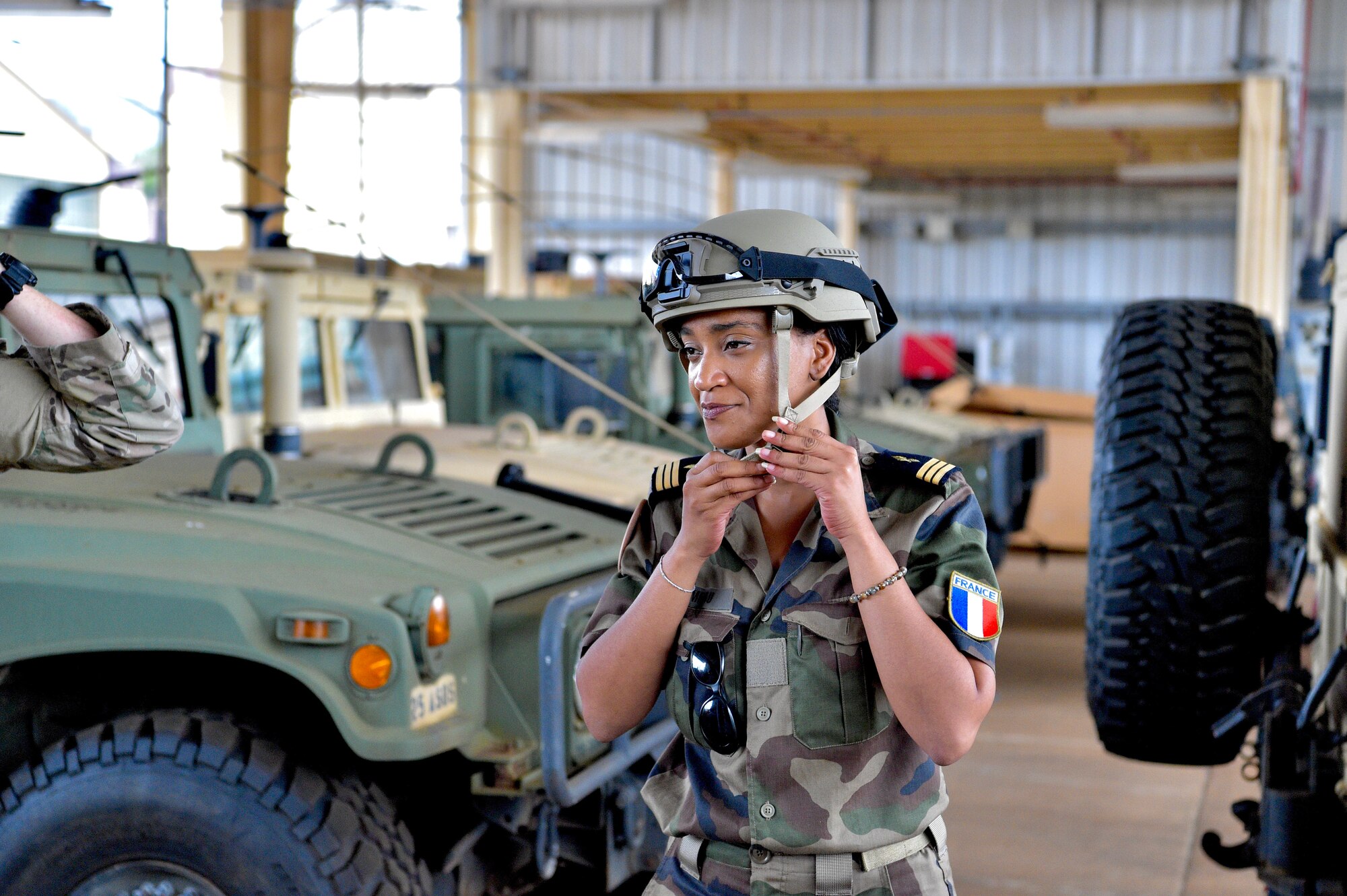 French Air Force Gen. Louis Pena, talks with the members from the 25th Air Support and Operations Squadron to learn about the mission of the Tactical Air Control Party Airmen at Wheeler Army Airfield, Hawaii, June 30, 2021. Pena was briefed on the capabilities of the 25th ASOS and given a demonstration of the Polaris MRZR, a multi-terrain vehicle used by TACP Airmen. (U.S. Air Force photos by 1st Lt. Benjamin Aronson)