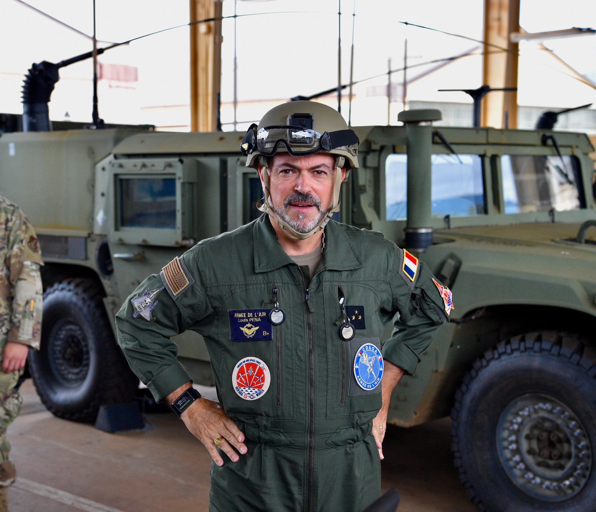 French Air Force Gen. Louis Pena, talks with the members from the 25th Air Support and Operations Squadron to learn about the mission of the Tactical Air Control Party Airmen at Wheeler Army Airfield, Hawaii, June 30, 2021. Pena was briefed on the capabilities of the 25th ASOS and given a demonstration of the Polaris MRZR, a multi-terrain vehicle used by TACP Airmen. (U.S. Air Force photos by 1st Lt. Benjamin Aronson)