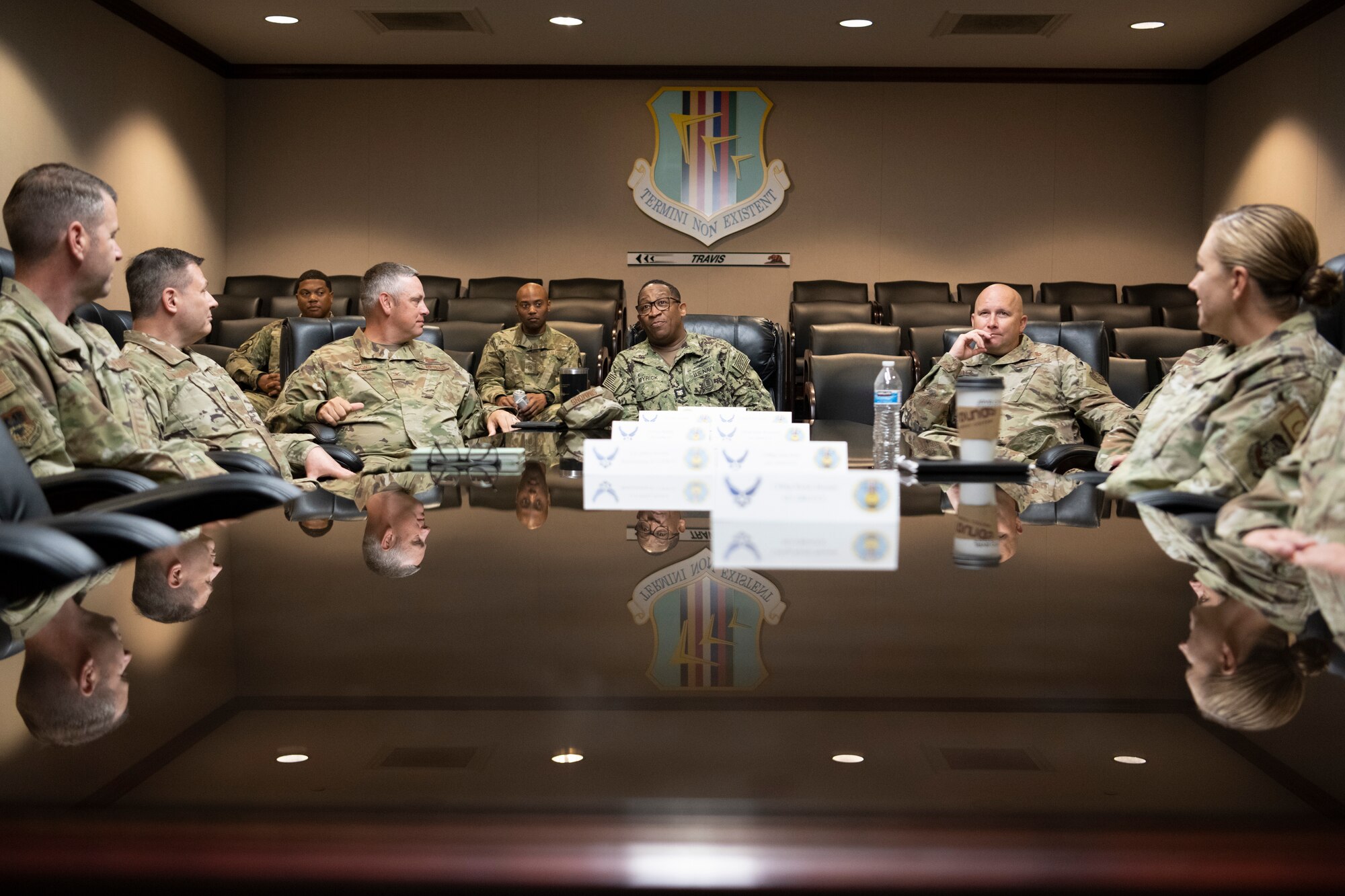 People sit at a conference table