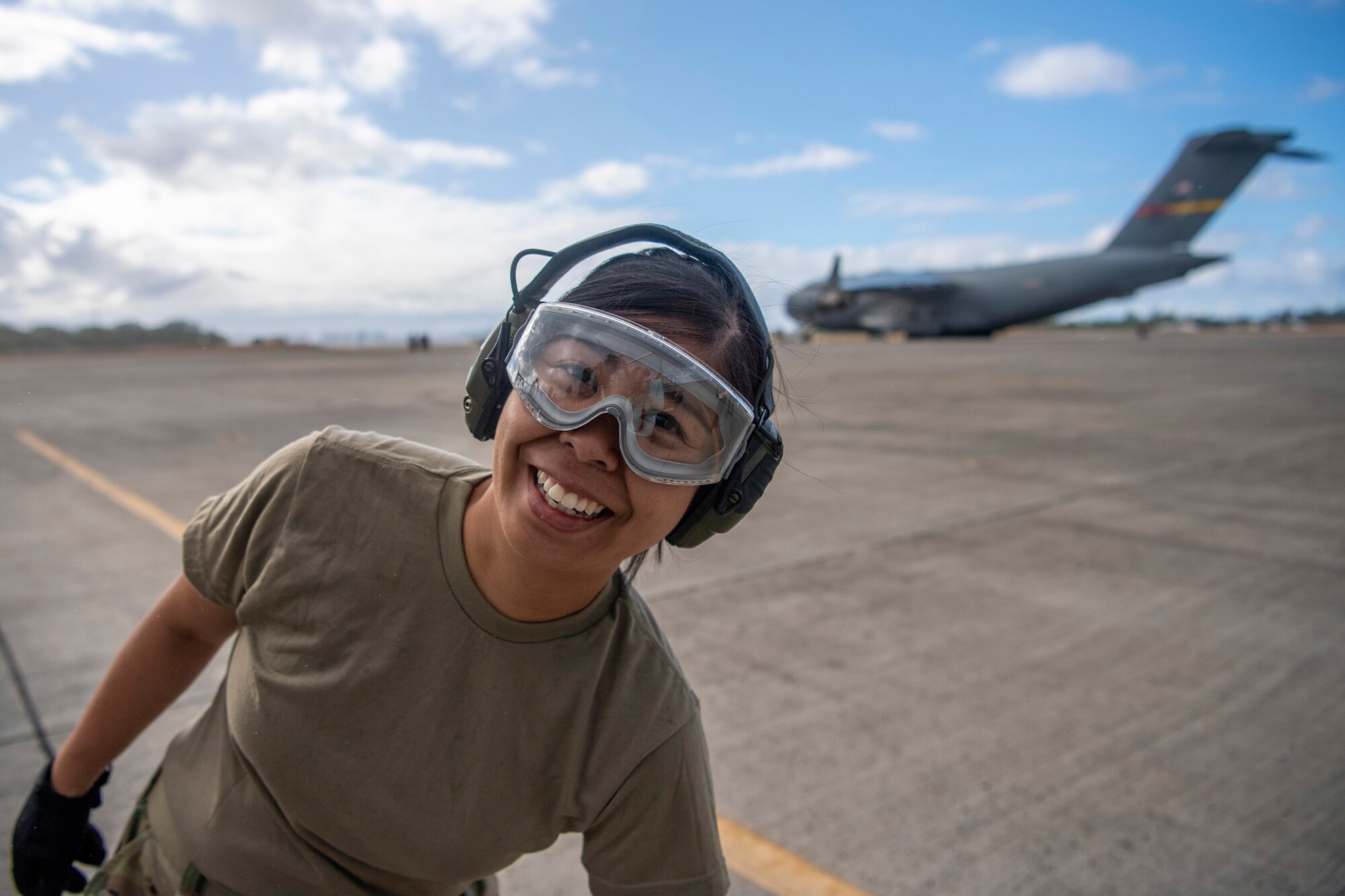 Senior Airman Mayleen Cuestas from the 48th Aerial Port
Squadron prepares for the engine running onload/offload
(ERO) exercise while at Joint Base Pearl-Harbor-Hickam
June 13, 2021.
.
