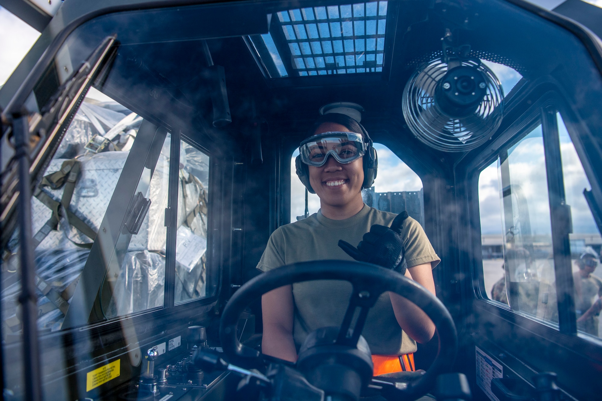 Senior Airman Konoe Key, 48th Aerial Port Squadron
waits for the engine running onload/offload (ERO)
exercise to start while at Joint Base Pearl-Harbor-
Hickam June 13, 2021
