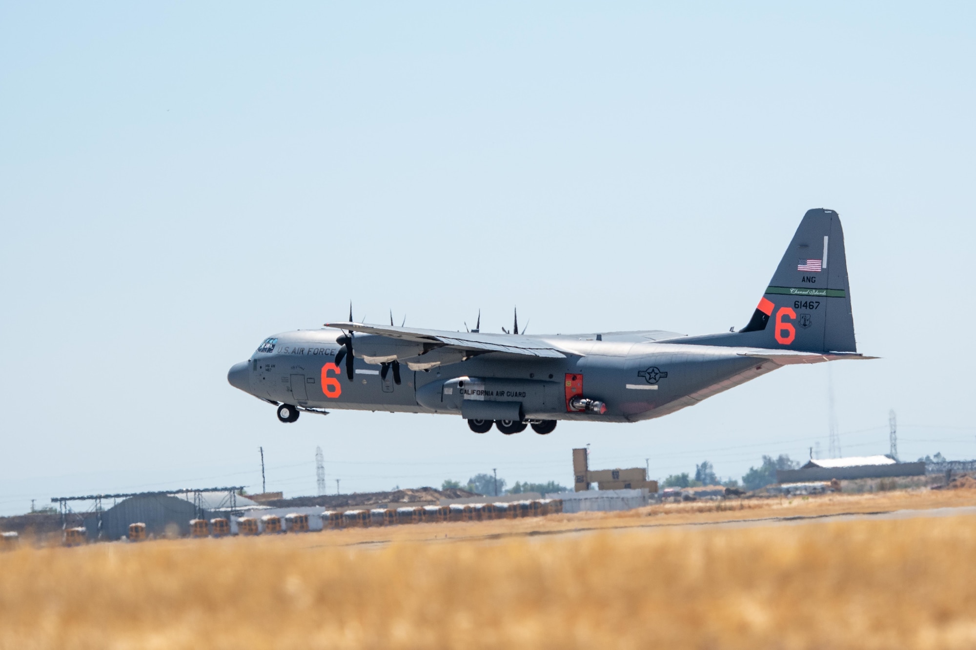 Air National Guard C-130, MAFFS 6 out of Channel Islands, Calif. launches July 14, 2021, from CAL FIRE Air Tanker Base