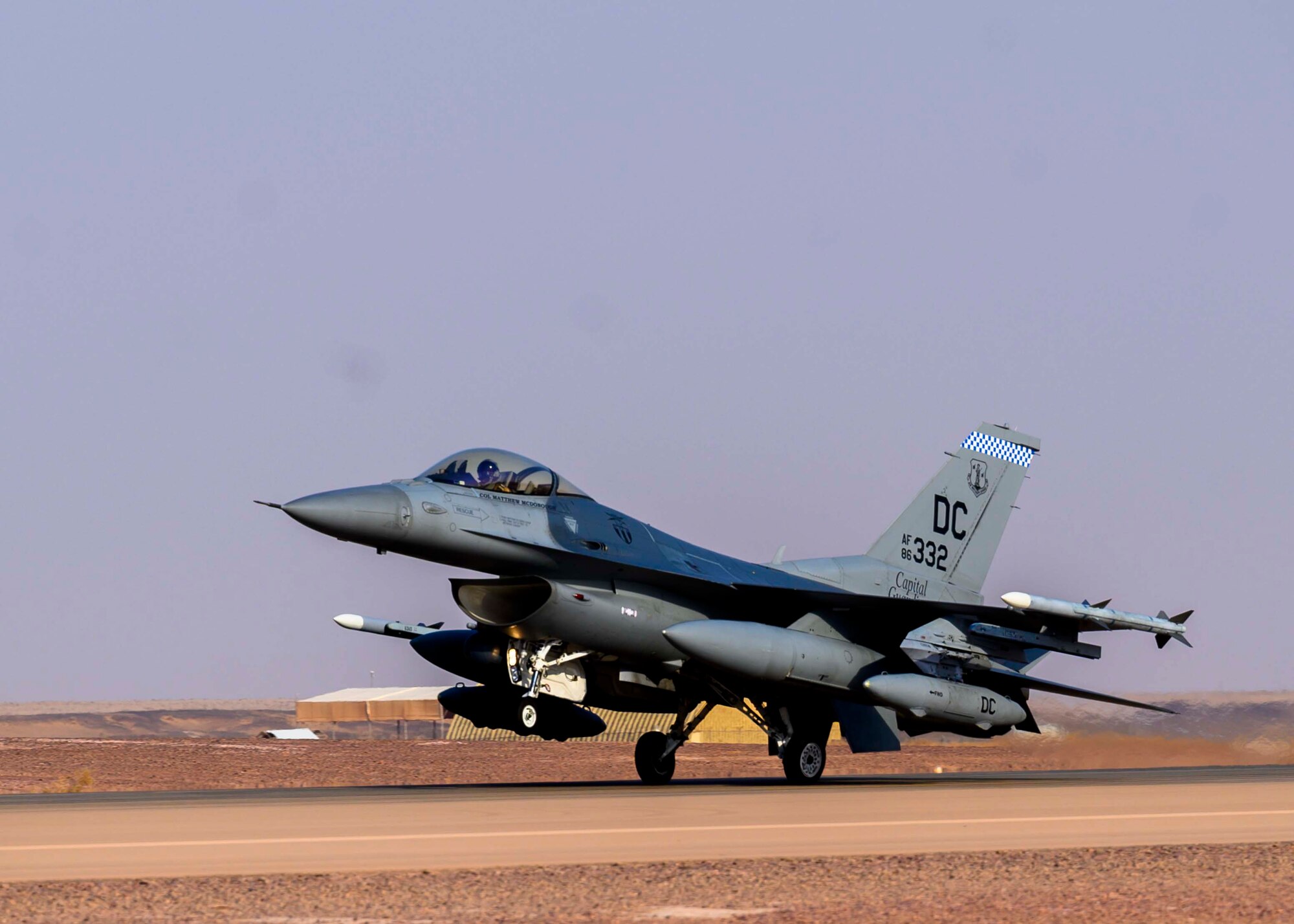 A U.S. Air Force F-16C Fighting Falcon from District of Columbia Air National Guard’s 113th Wing, known as the “Capital Guardians,”  lands on the flight line at Prince Sultan Air Base, Kingdom of Saudi Arabia, July 9, 2021. The wing deployed a contingent of F-16s to PSAB to reinforce the base’s defensive capabilities, provide operational depth, and support U.S. Central Command operations in the region. (U.S. Air Force Photo by Senior Airman Samuel Earick)