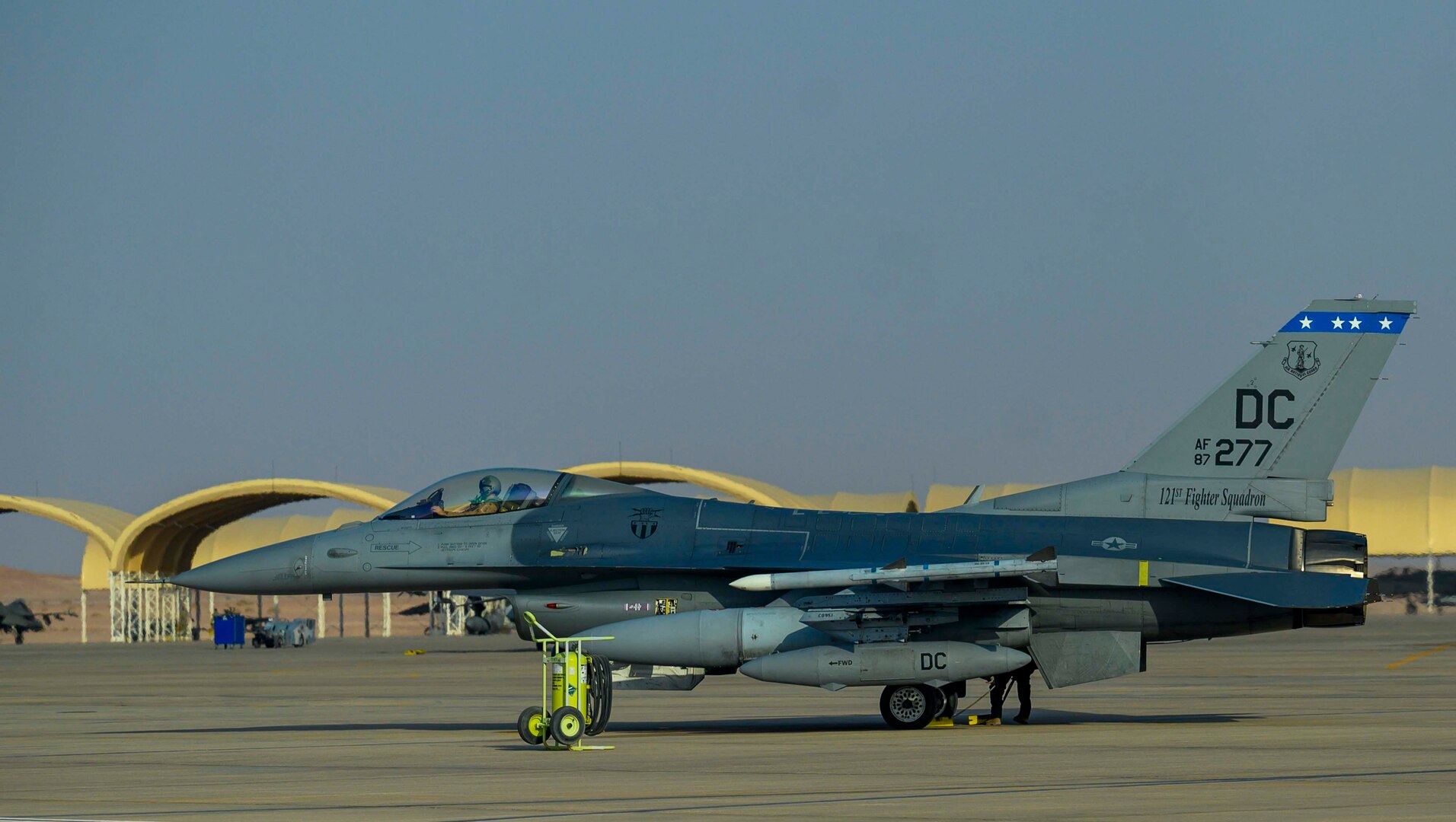 A U.S. Air Force F-16C Fighting Falcon from District of Columbia Air National Guard’s 113th Wing, known as the “Capital Guardians,” sits on the flight line at Prince Sultan Air Base, Kingdom of Saudi Arabia, July 9, 2021. The wing deployed a contingent of F-16s to PSAB to reinforce the base’s defensive capabilities, provide operational depth, and support U.S. Central Command operations in the region. (U.S. Air Force Photo by Senior Airman Samuel Earick)