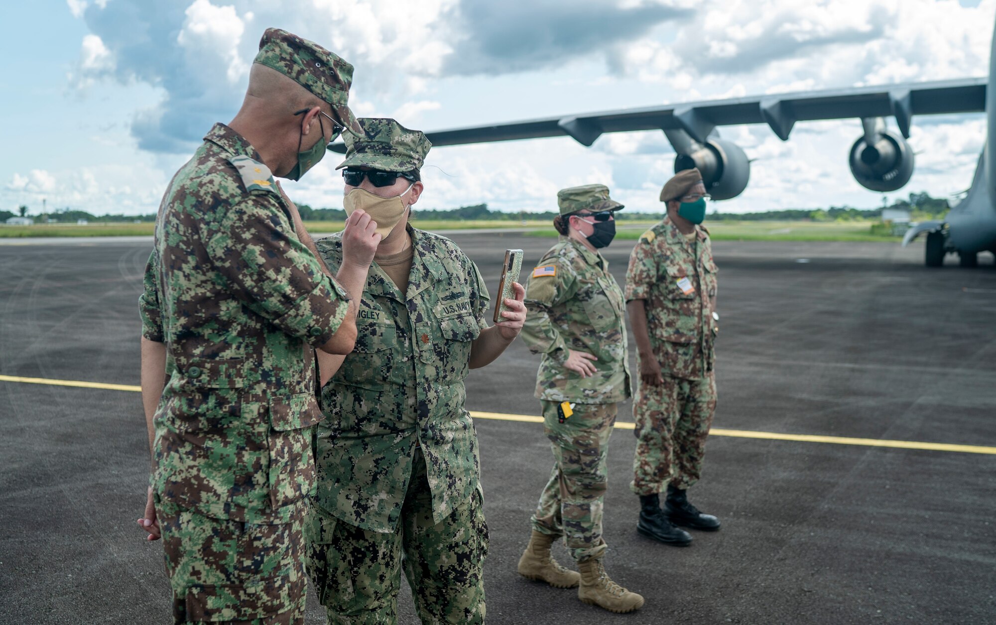 U.S. military and Surinamese military personnel oversee the donation of field hospital equipment at Johan Adolf Pengel International Airport, Suriname, July 16, 2021.