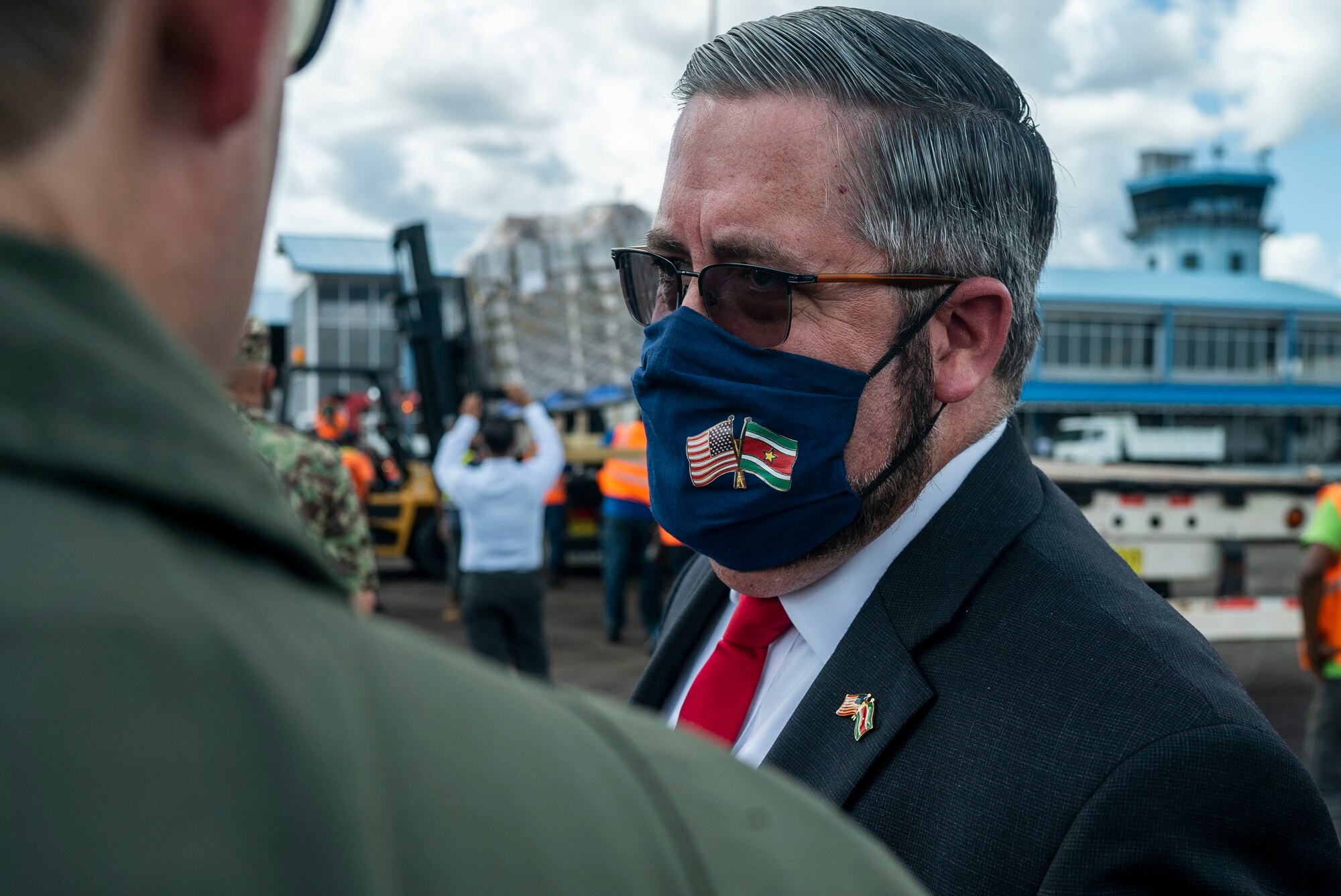 A member of the U.S. embassy in Suriname oversees the donation of field hospital equipment to the Surinamese Ministry of Health at Johan Adolf Pengel International Airport, Suriname, July 16, 2021.