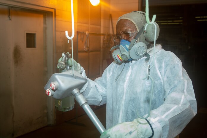 Norfolk Naval Shipyard's John Horton performing his tasks.