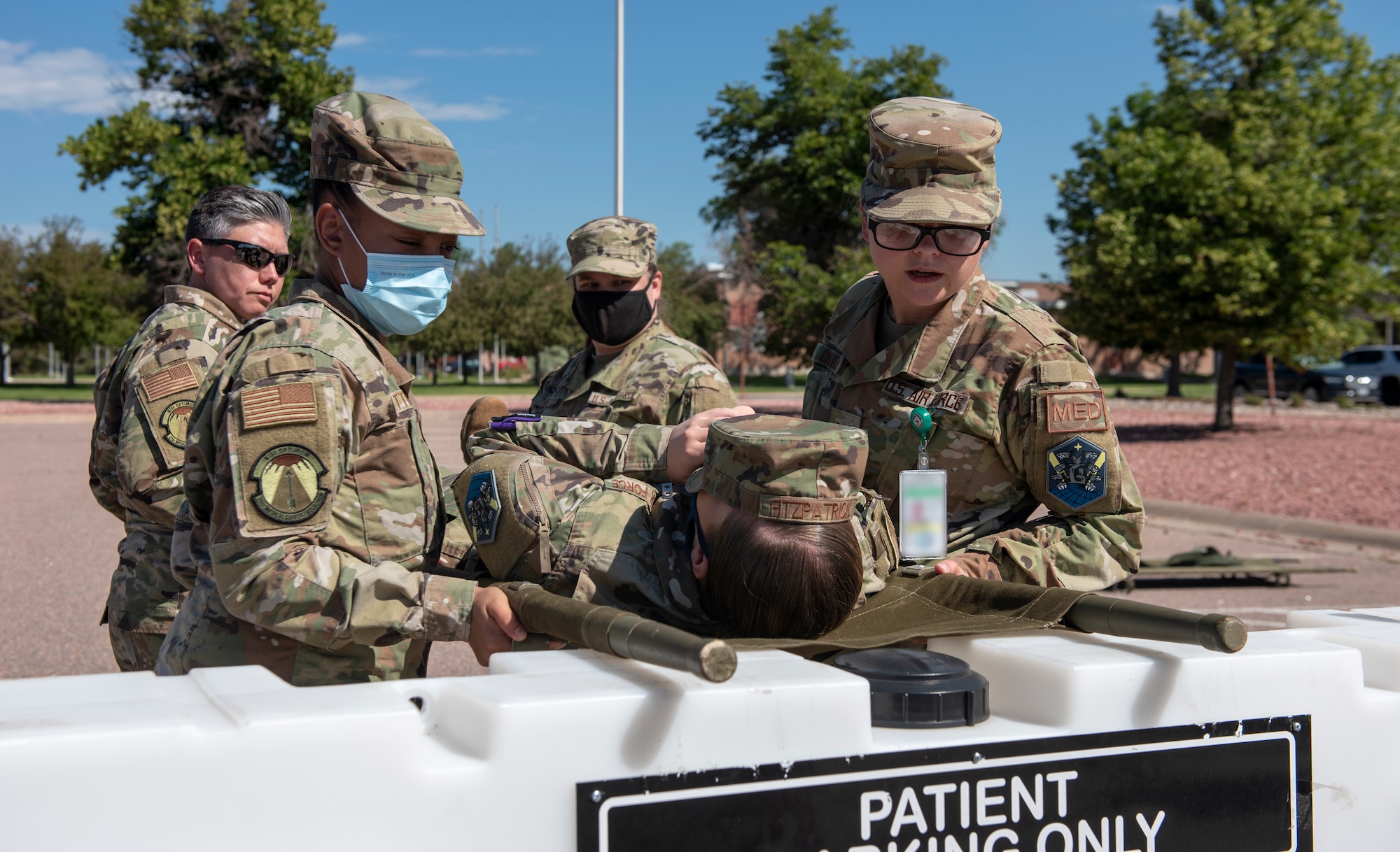Airmen practice litter carrying