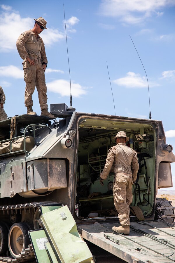 Cpl. Christian Fontaine, a crew chief with 4th Assault Amphibian Battalion, 4th Marine Division, conducts preparations to advance at range 114 during Integrated Training Exercise (ITX) 4-21 at Camp Wilson, Marine Corps Air Ground Combat Center Twentynine Palms, California on July 20, 2021. ITX is the culmination of Marine Forces Reserve units’ training cycle as they participate in a live-fire, combined arms exercise as a part of an integrated Marine Air Ground Task Force.  (U.S. Marine Corps photo by Lance Cpl. David Intriago)