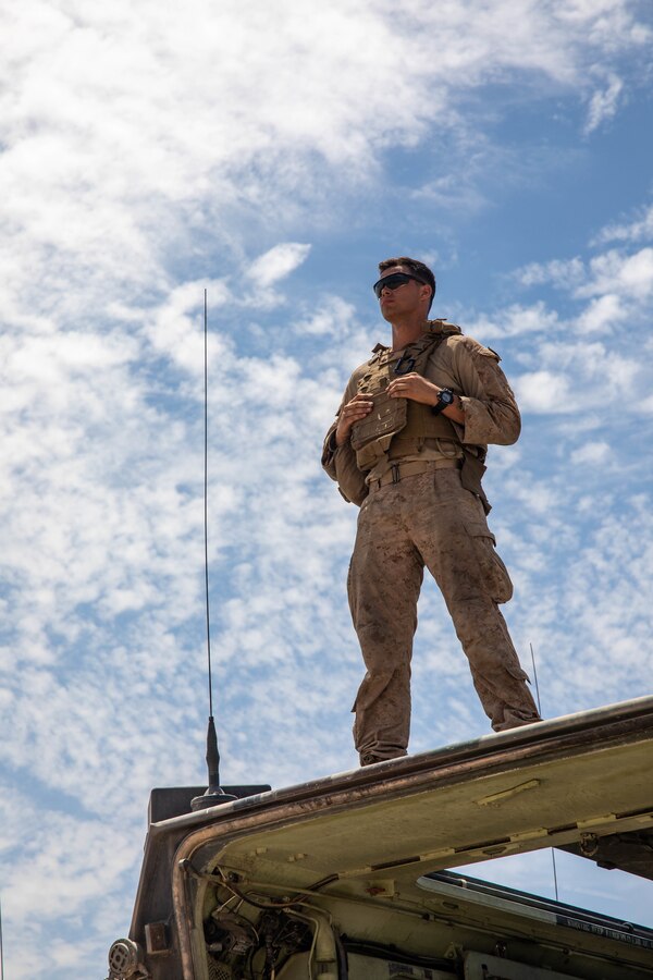 Cpl. Christian Fontaine, a crew chief with 4th Assault Amphibian Battalion, 4th Marine Division, conducts preparations to advance at range 114 during Integrated Training Exercise (ITX) 4-21 at Camp Wilson, Marine Corps Air Ground Combat Center Twentynine Palms, California on July 20, 2021. ITX is the culmination of Marine Forces Reserve units’ training cycle as they participate in a live-fire, combined arms exercise as a part of an integrated Marine Air Ground Task Force. (U.S. Marine Corps photo by Lance Cpl. David Intriago)