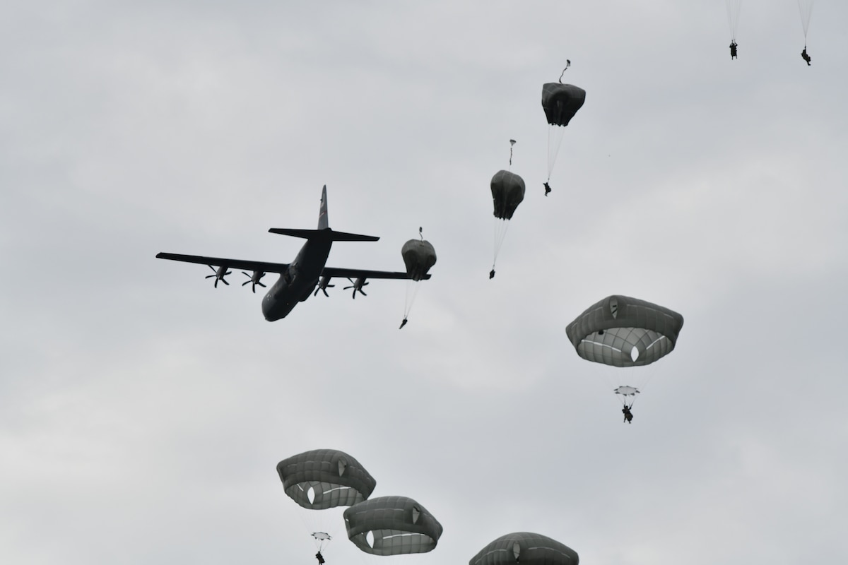 The 815th Airlift Squadron, or Flying Jennies, provided airdrop support for more than 1300 paratroopers from the 4th Infantry Brigade Combat Team Airborne, 25th Infantry Division for their jumps during a training exercise at Joint Base Elmendorf-Richardson, Alaska, July 13-16, 2021. They also dropped over 30,000 pounds of heavy equipment, completed more than eight hours of low-level tactical flight and more than 15 assault landings during the four-day training exercise. (U.S. Air Force photo by Master Sgt. Jessica Kendziorek)