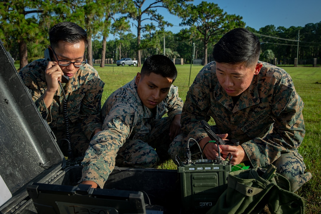 U.S. Marines with 2nd Marine Regiment, 2nd Marine Division, test an AN/PRC-160(V) as part of the 2nd MARDIV High-Frequency Competition near Camp Blanding, Fla., July 13, 2021. The competition enhanced HF transmission proficiency and capabilities to prepare Marines for future expeditionary conflicts where the area is either contested or degraded.