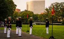 Captain Isaac Seals, the U.S. Marine Corps Silent Drill Platoon, Platoon Commander, salutes the parade staff during a Tuesday Sunset Parade at the Marine Corps War Memorial, Arlington, VA, June 15 2021.