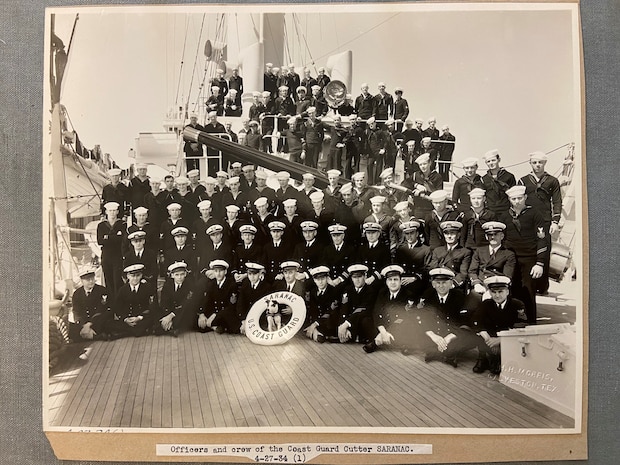 A photo of the "Officers and crew of the Coast Guard Cutter SARANAC."