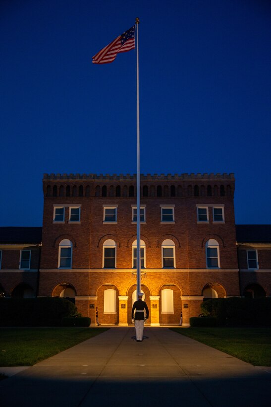 Sergeant Maj. Adrian Tagliere, Battalion Sergeant Major, conducts “Report” during the Friday Evening Parade at Marine Barracks Washington, July 16, 2021.