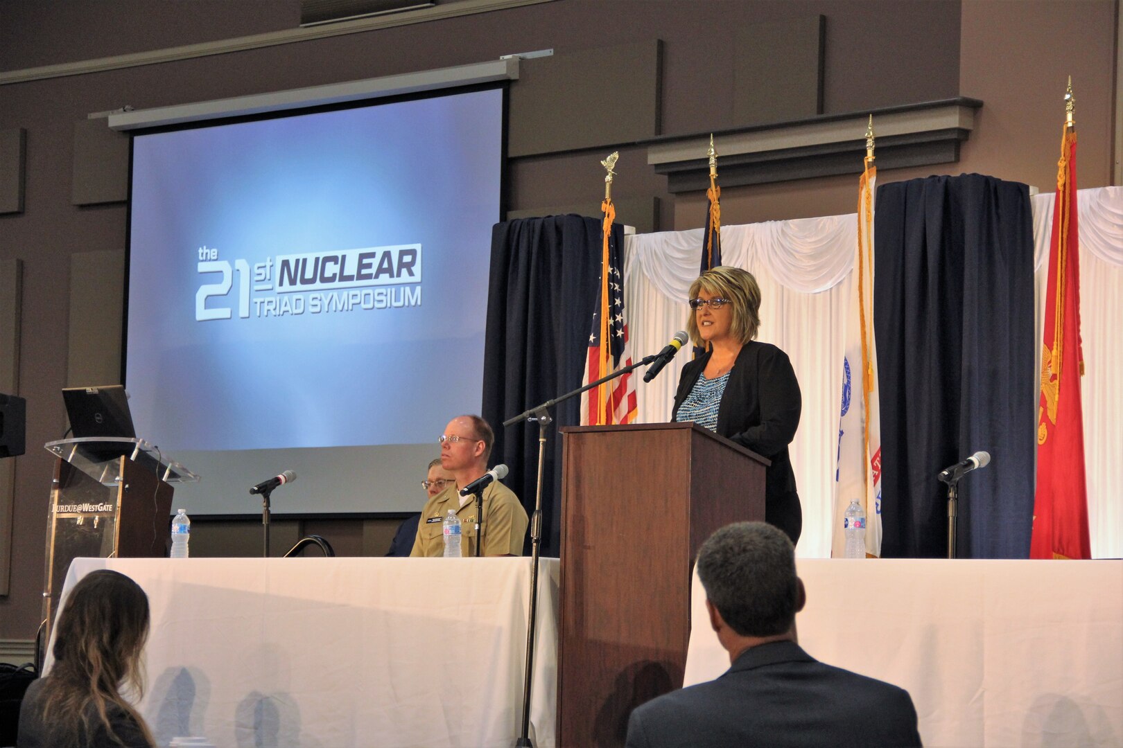 Dr. Angela Lewis, NSWC Crane Technical Director, speaks at the 2021 Triad Symposium.