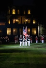 The Official Color Guard of the Marine Corps marches on during the Friday Evening Parade at Marine Barracks Washington, July 16, 2021.